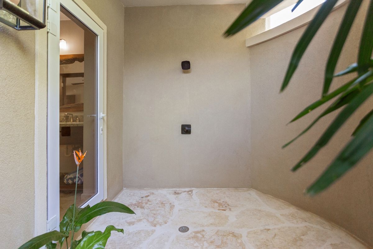 Coral Bungalow Outdoor Shower | Sirenian Bay | Luxury Vacation Resort in Placencia, Belize